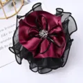 Elegant burgundy satin and black mesh flower hair scrunchie with sparkling rhinestone center. - Deep purple