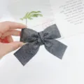 Black rhinestone bow hair clip, sparkling crystal hair accessory for women and girls detail. - Advanced Gray Long Tail Bow Spring Top Clip