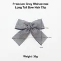Detailed shot of sparkling grey rhinestone bow hair clip, featuring shimmering crystals. - Long Tail Bow Hair Clip / Premium Grey