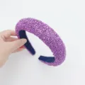 Close-up view of the purple textured wide headband, showing the unique pebbled surface detail. - Purple Lucky Stone 3.5 Headband