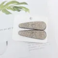 Sparkling rhinestone hair clips in elegant champagne color, secure snap design for daily styling. - Waterdrop BB Clip / Champagne