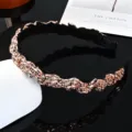 Exquisite baroque rhinestone headband with sparkling crystals and elegant black pleated design. - Champagne