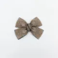 Sparkling champagne rhinestone bow hair clip elegant crystal hairpin for women daily styling. - Cross Spring Clip / Champagne