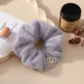 Grey plush hair scrunchie with dazzling rhinestone detail, elegant Korean style winter hair accessory. - Grey Purple