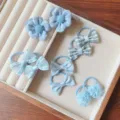 Set elastici capelli bambini con fiocchi e fiori a quadri blu, cordini elastici carini bambina. - Set di 5 Paia / Blu