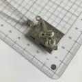 Silver music note book locket necklace pendant delicate jewelry gift for women and girls daily wear. - QX-14