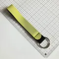 Detailed view of yellow and black wrist lanyard keychain made of neoprene material with ring. - Lemon Yellow