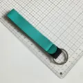 Neoprene wristlet keychain lanyard for outdoor portable use, durable strap detail view. - Peacock Blue