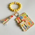 Blumen PU Kartenhalter mit Silikonperlen Armband Schlüsselanhänger und Quasten-Set. - Gansgelb