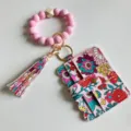 Blumen PU-Leder Kartenetui Schlüsselanhänger mit rosa Silikonperlen Armband und Quaste. - Taro Rosa