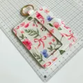 Floral pattern PU leather card holder with cute floral print, keychain and clear ID window. - Bow