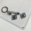 Evil eye keychain Turkish blue eye metal keyring amulet lucky charm bag backpack accessory - Double Evil Eye