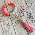 Bunte Silikonperlen Schlüsselanhänger Armband mit PU Leder Quaste, modisches Handgelenk Access. - Rosa