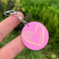 Pink wooden keychain detail, engraved heart pattern with mama text and cute metal clasp. - Style 1