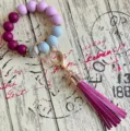 Bunte Silikon Perlen Armband Schlüsselanhänger mit PU Leder Quaste und roségoldenen Beschlägen. - Lila