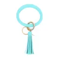 Gedetailleerd weergave van de turquoise PU lederen armband sleutelhanger met stijlvolle kwast. - Muntgroen