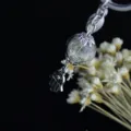 Dandelion seed glass globe keychain, minimalist metal pendant jewelry for women and men. - Antique Silver Hamsa Style