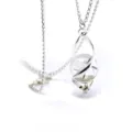 Detail view of dandelion crystal glass necklace with silver chain and spiral pendant design. - Silver
