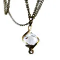 Vintage bronze chain necklace featuring a clear glass ball pendant with natural dandelion seed. - Bronze