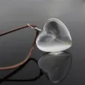 Clear heart shaped dandelion seed pendant close up, exquisite transparent resin necklace jewelry detail. - Dandelion Heart / Brown Chain