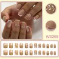 Unghie finte nude chic con foglie bianche e linee glitterate dorate, stile indossabile medio lungo. - Stile Linea Polvere d'Oro Foglia Bianca Nude (W3269) / 24 pezzi per scatola