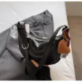 Black PU Leather Crescent Shoulder Bag, Stylish Dumpling Handbag for Daily Commute - Black With Pendant