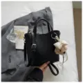 Black leather tote bag casual commuter bucket bag with cute puppy pendant and strap. - Black With Pendant