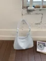 Light blue leather shoulder bag variant, stylish commuting hobo handbag with knotted strap. - Blue Without Pendant