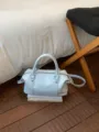 Light blue stylish pillow shoulder bag for women, versatile PU leather handbag with silver hardware. - No Pendant / Blue