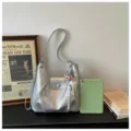 Silver stylish shoulder bag for women, trendy tote with zipper pockets and plush charm. - Silver With Pendant