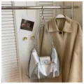 Trendy silver hobo shoulder bag for women, versatile PU leather daily casual handbag style. - Silver No Pendant