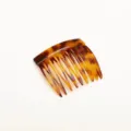 Close-up detail of the mini tortoiseshell hair comb, showing fine teeth and sleek resin finish. - 9-Teeth Insertion Comb (FS48) / Caramel color
