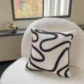 Housse de coussin brodée abstraite moderne, oreiller de canapé confortable et texturé. - Longs Rubans