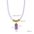 Chique paarse lederen koord ketting met gouden kralen en natuurstenen hanger. - Stijl C