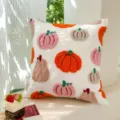 Housse de coussin brodée d'Halloween avec de jolies citrouilles colorées pour la décoration. - Petite Citrouille