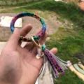 Colorful leopard print bangle keychain with PU leather tassel and gold hardware detail. - Colorful Leopard