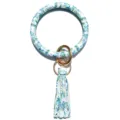 Blauwe bladafdruk PU lederen ronde armband sleutelhanger met metalen ringen kwast detail. - Blad