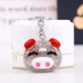 Glitter acrylic pig keychain detail shot, cute cartoon design pendant for bags and keys. - Gray Style