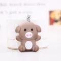 Cute plush pig keychain for zodiac year, soft flocked animal key ring bag charm pendant. - Brown