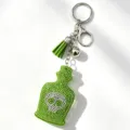Strass Totenkopf Parfumflasche Schlüsselanhänger mit grüner Quaste, stylischer Taschenanhänger. - Grasgrün