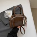 Korean style niche handbag shell bag women fashion chic casual shoulder crossbody bag - With Pendant / Brown