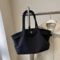 Black suede wing tote bag, minimalist shoulder handbag with front metal buckle strap. - S Black