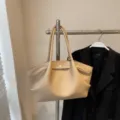 Beige leather tote bag with unique folded wing design, large capacity shoulder and handbag. - Y Khaki