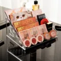 Clear acrylic makeup organizer 6-tier cosmetic display shelf for eyeshadow palettes and lipsticks. - Buckle 6-Tier Makeup Organizer / Clear