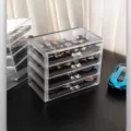 Clear acrylic badge storage box multi-layer drawer organizer for brooches and medals main view. - 4 Tiers