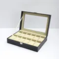 Schwarze Leder Uhrenbox mit 12 Fächern, Sichtfenster und Kissen für Uhren und Schmuck. - Schwarzes Leder 12 Fächer