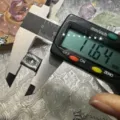 Accessorio distanziatore in metallo argentato con dettaglio strutturato, misura di precisione. - Ciondolo Stile Borsa / 11x10mm 10 Pezzi/Pacchetto / Argento