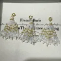 Handcrafted crystal bead tassel charm for bag bracelet jewelry accessory with gold. - Cropped White