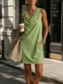 Sleeveless cowl neck lime green mini dress detail shot showing pocket design and street style. - Matcha Green