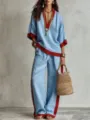 Ensemble automnal élégant avec col en V, manches mi-longues et pantalon ample chic. - XS / Haut Et Bas / Bleu ciel